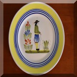 P48. Quimper luncheon plate decorated with a man. 8” - $28 